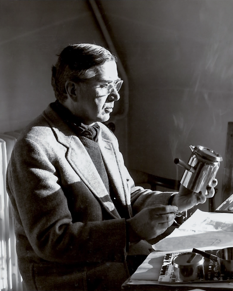 Magnus Læssøe Stephensen examining a design prototype